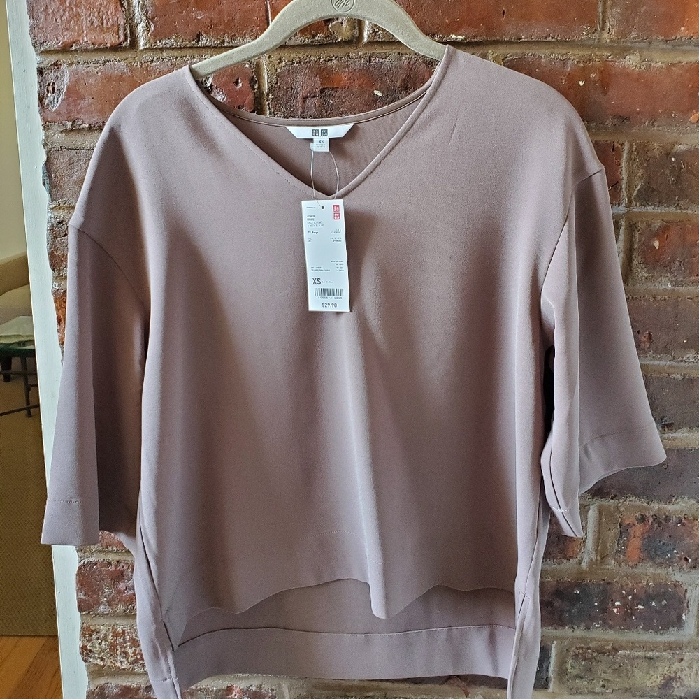 Beige Uniqlo top.